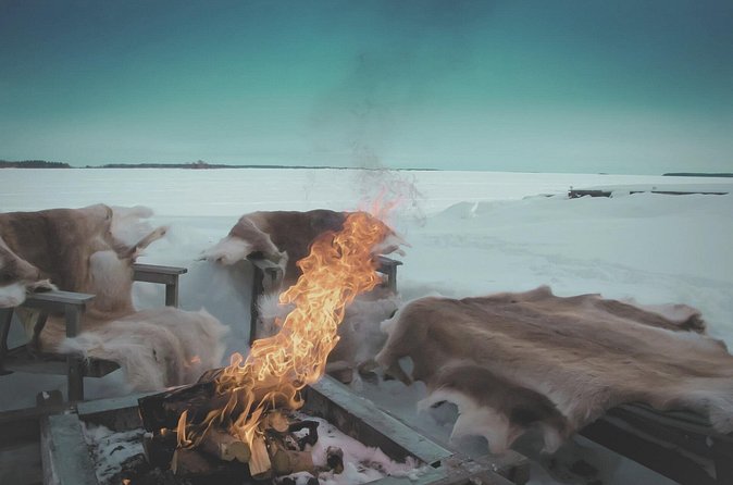 Arctic Darkness & Starlight Adventure with Snowshoes - The campfire is the heart of the evening