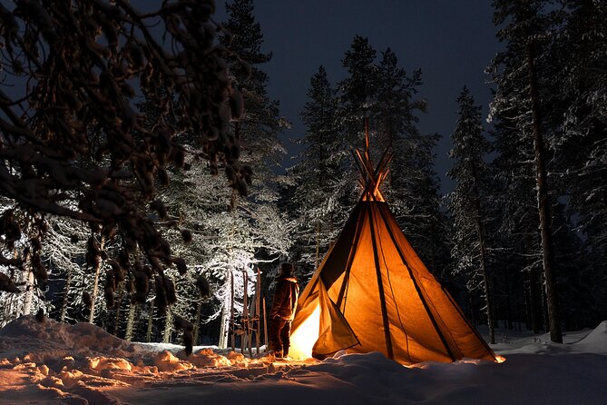Evening Ski Trek to the Wilderness - Extra Small group - Warming up inside the traditional kota