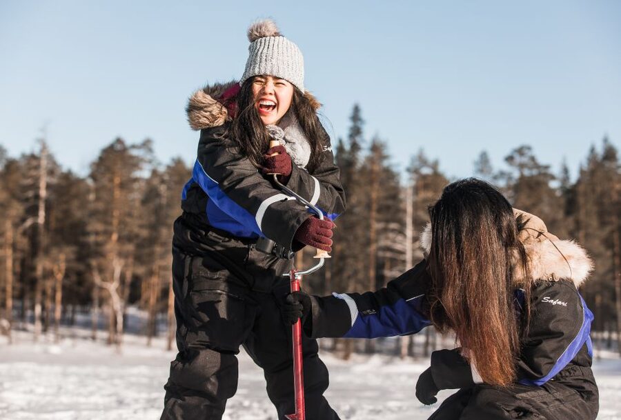 From Rovaniemi: Snowshoeing and Ice Fishing Tour - Crossing the lake to your fishing spot