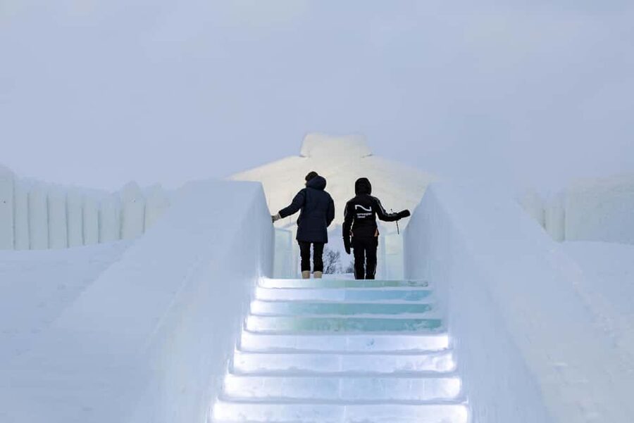 From Tromsø: Ice Domes Snow Park and Wilderness Experience - Getting fitted for the cold