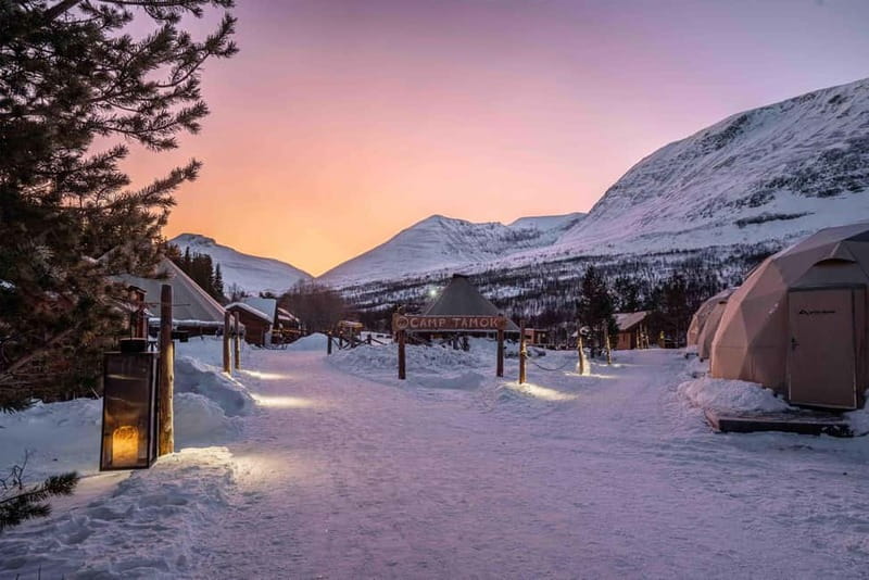 From Tromsø: Snowmobiling at Camp Tamok & Snow Park Visit - Getting fitted for Arctic weather