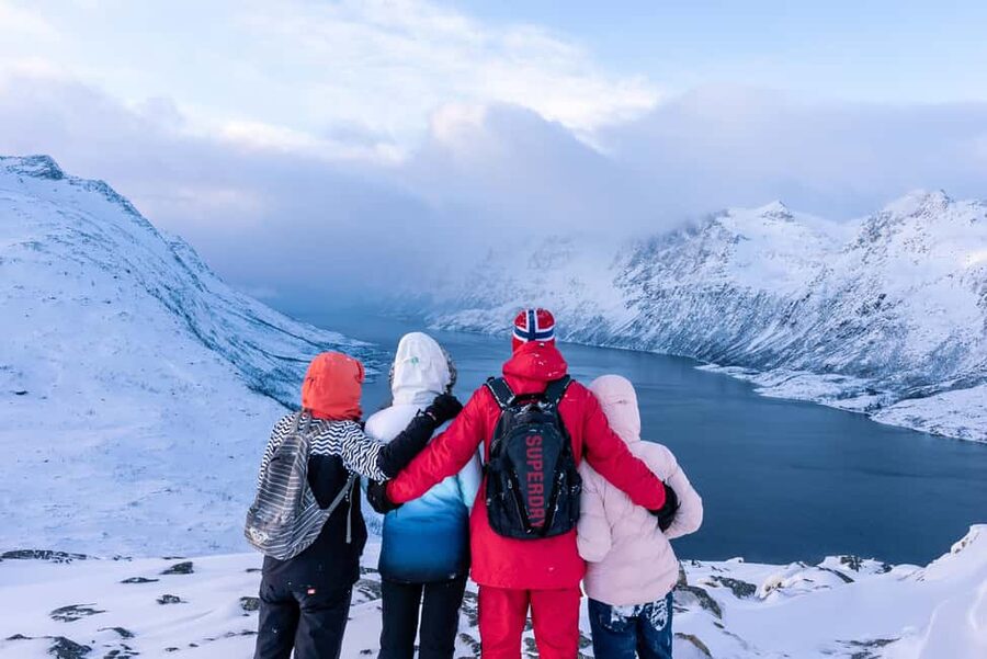 From Tromsø: Snowshoe Hike with Local Guides - Learning to use snowshoes before the trail begins