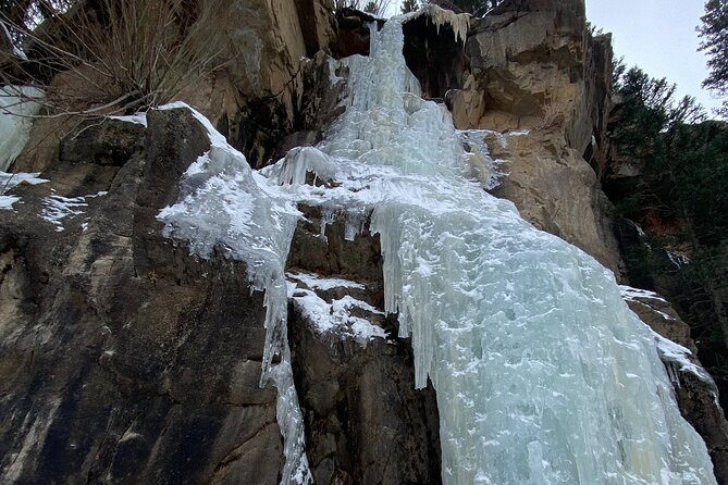 Frozen Waterfall Snowshoe Tour Estes Park - A frozen waterfall reached on snowshoes