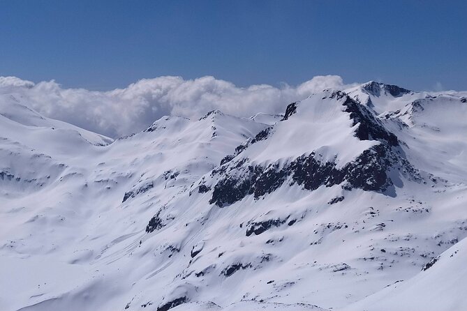Full day Snowshoeing tour to Bezbog peak 2645 m in Pirin Mountains - Reaching the 2,645-meter summit