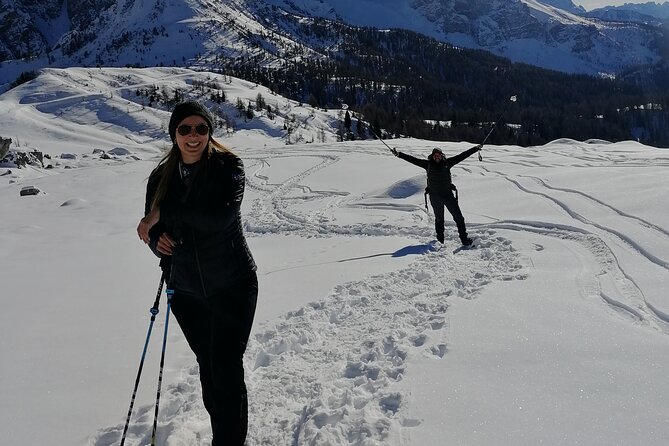 Guided Snowshoeing Day to Discover the Dolomites - A lunch break with the mountains in view