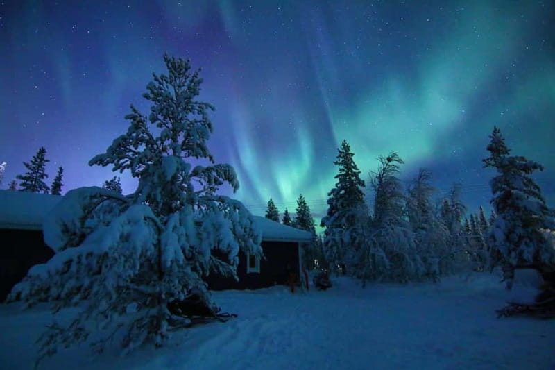 Kiruna: Snowshoe Trek with Aurora Hunt and Warm Beverage - Getting fitted at Kiruna Guidetur