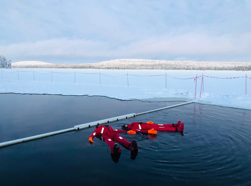 Lapland: Ice Fishing, Floating & BBQ Snow Adventure - The salmon BBQ inside a traditional kota