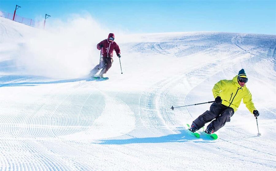 Mt. Fuji Skiing Experience- YETI Ski Resort & Onsen Day Trip - Fuji and Suruga Bay from the upper slopes