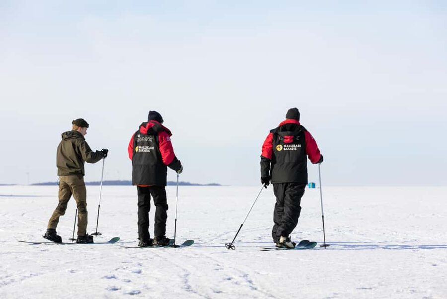 Oulu: Arctic Sea Snowshoe Experience - A campfire in the middle of the ice