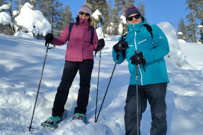 Private Snowshoeing in Levi - Following forest tracks and climbing a little