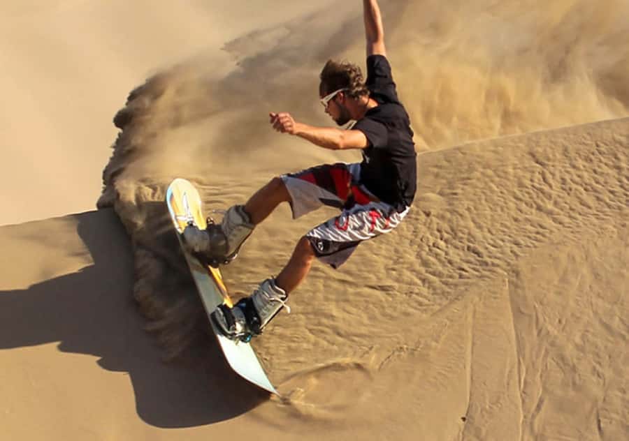 Pro Sanboarding or skiing in Huacachina from Lima - Day trip - Two hours across the dunes in a buggy