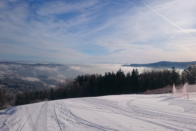 Skiing For Beginners - Private Day Trip from Krakow - Getting fitted for skis, a snowboard, and a helmet