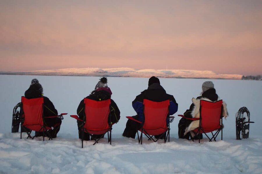 Snowshoe experience with traditional beverages in Lapland - The fire-side picnic