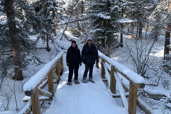 Snowshoeing Adventure in the Rocky Mountains Close to Denver - Getting fitted with snowshoes and poles