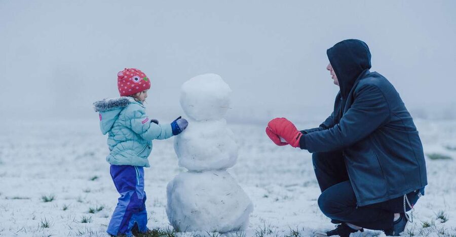 Vegas Winter Adventure: Mt. Charleston Snow Day - Building a snowman with supplied accessories