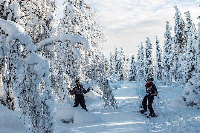 Wilderness snowshoe adventure - Campfire time in a wooden shelter