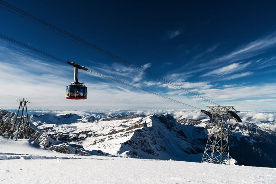Zurich: Titlis First Time Ski Experience & Lucerne - Snow tubing adds easy fun to the ski session